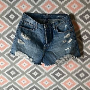 These are faded blue ripped jean shorts size 13, high rise